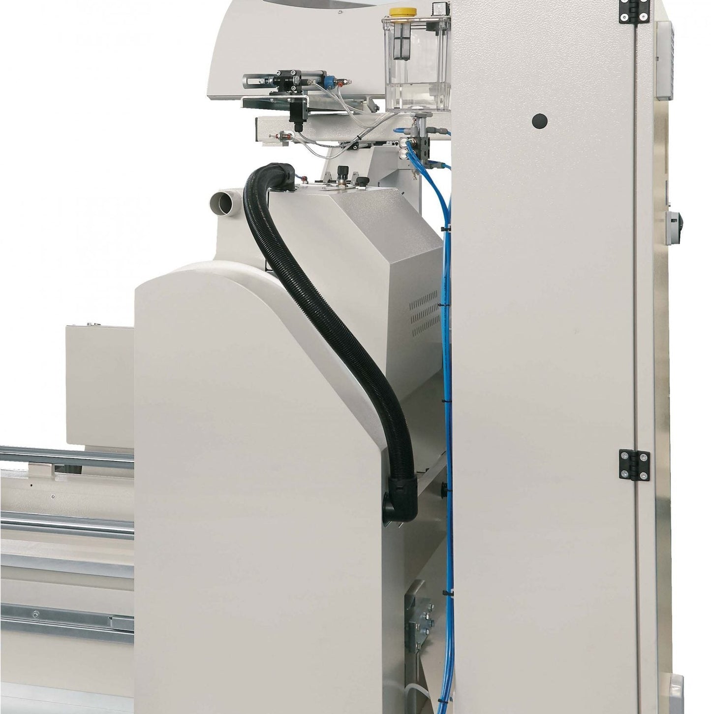 Cutting area of the Basic double head miter saw with integral safety protections for secure aluminum and PVC machining.