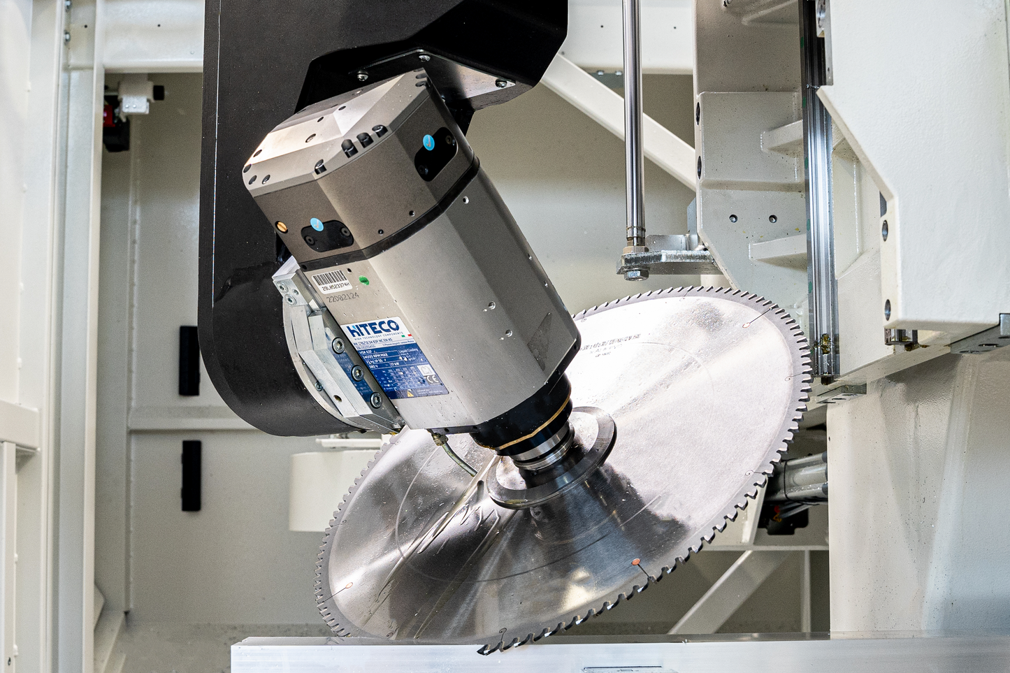 Close-up of the Bolero 4’s electrospindle featuring a tilted precision cutting blade, optimized for angled machining operations on aluminum and other materials.