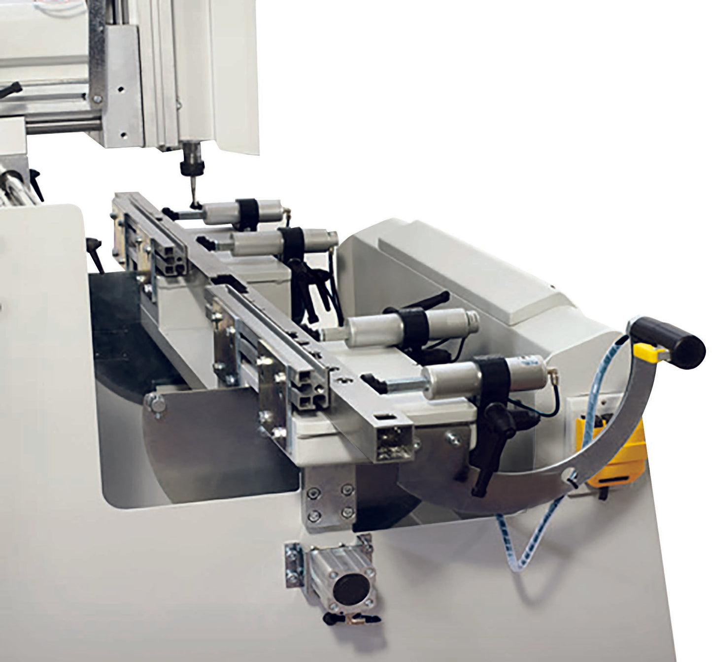 Detailed view of the Flex Copy Router's adjustable pneumatic clamps and worktable, ideal for precise slotting and cutting in profiles.
