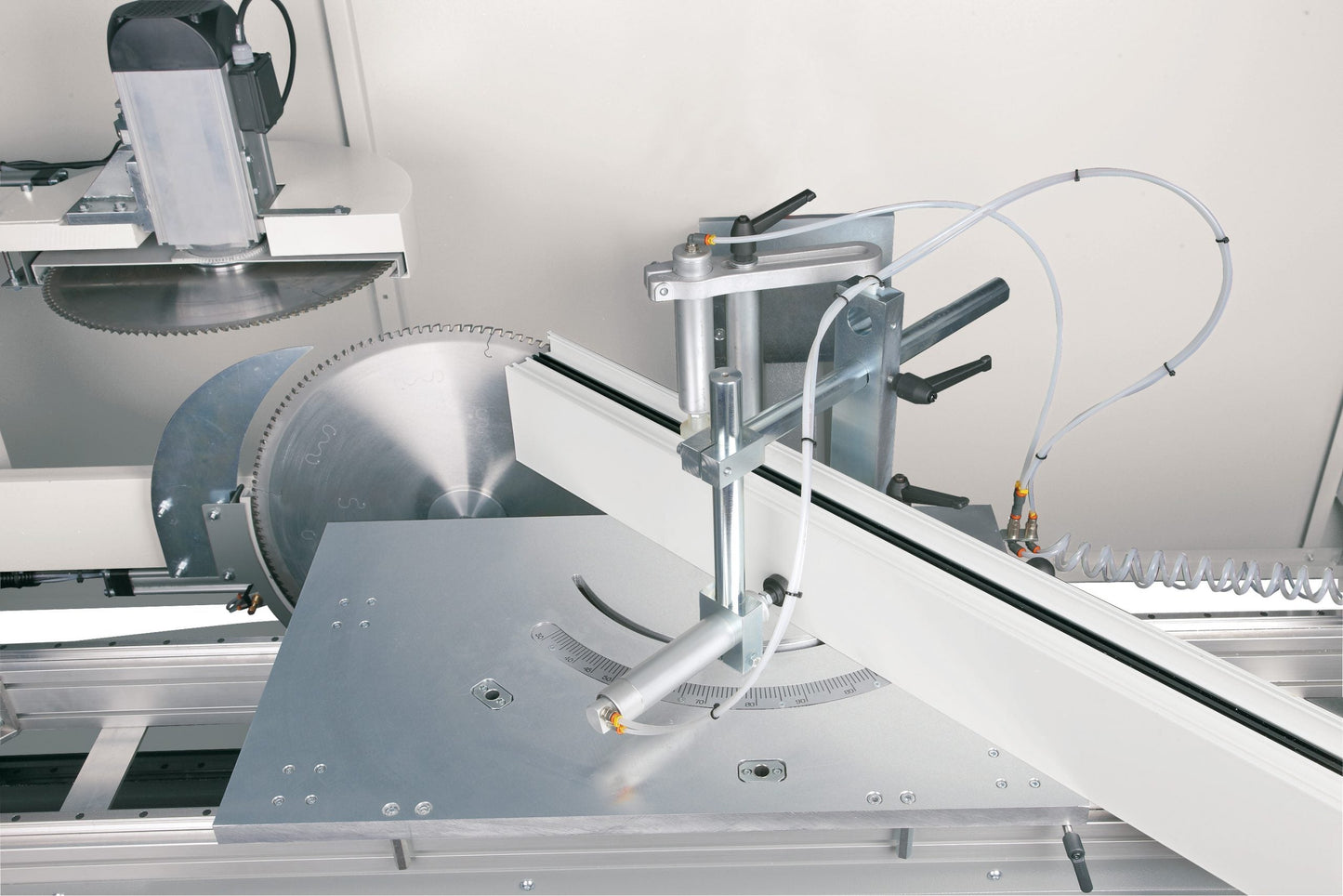Side angle view of the Magma End-Milling Machine, demonstrating its robust structure and ergonomic design.