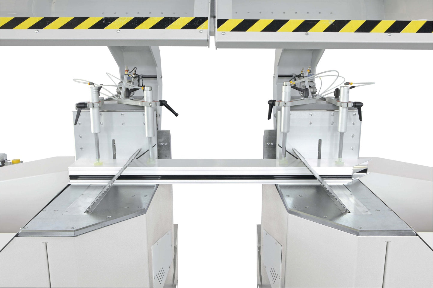 The Selecta A cutting-off machine executing compound angle cuts with precision on aluminum profiles.