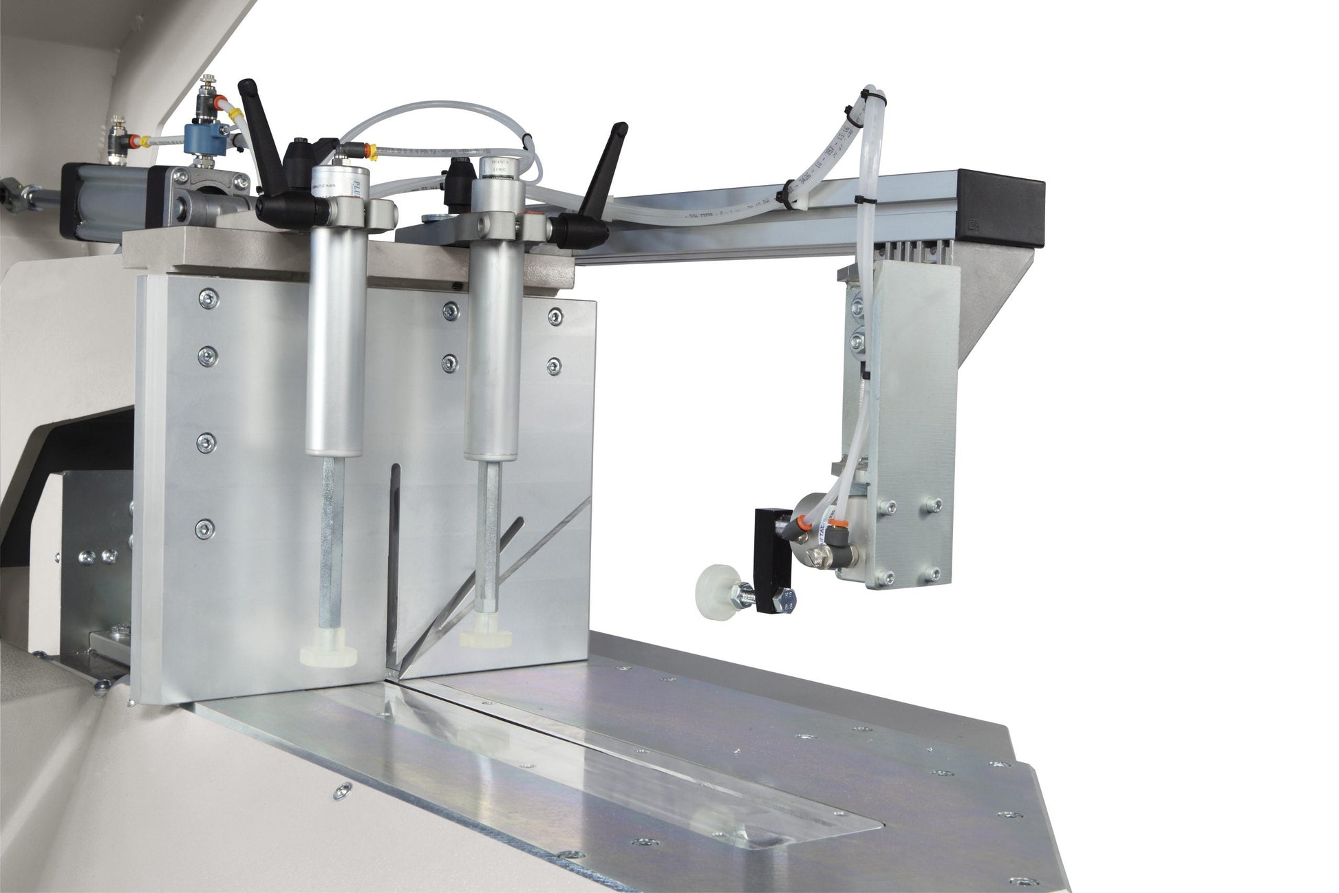 Image showcasing the optional accessories of the Kappa cutting machine, including pneumatic clamps and pivoting stops.