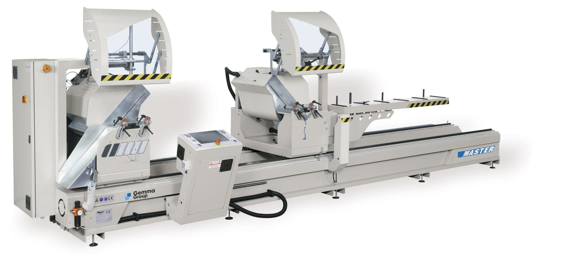 Open cutting area of the Master A double head miter saw, highlighting safety features and adjustable cutting heads.