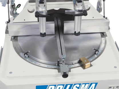 PRISMA cutting-off machine's rotating table with precise angle adjustments for straight and miter cuts.